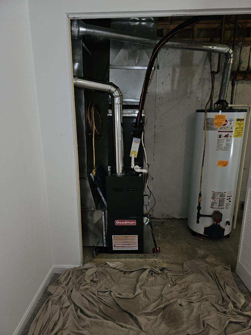 High-efficiency Goodman furnace replacement in basement closet