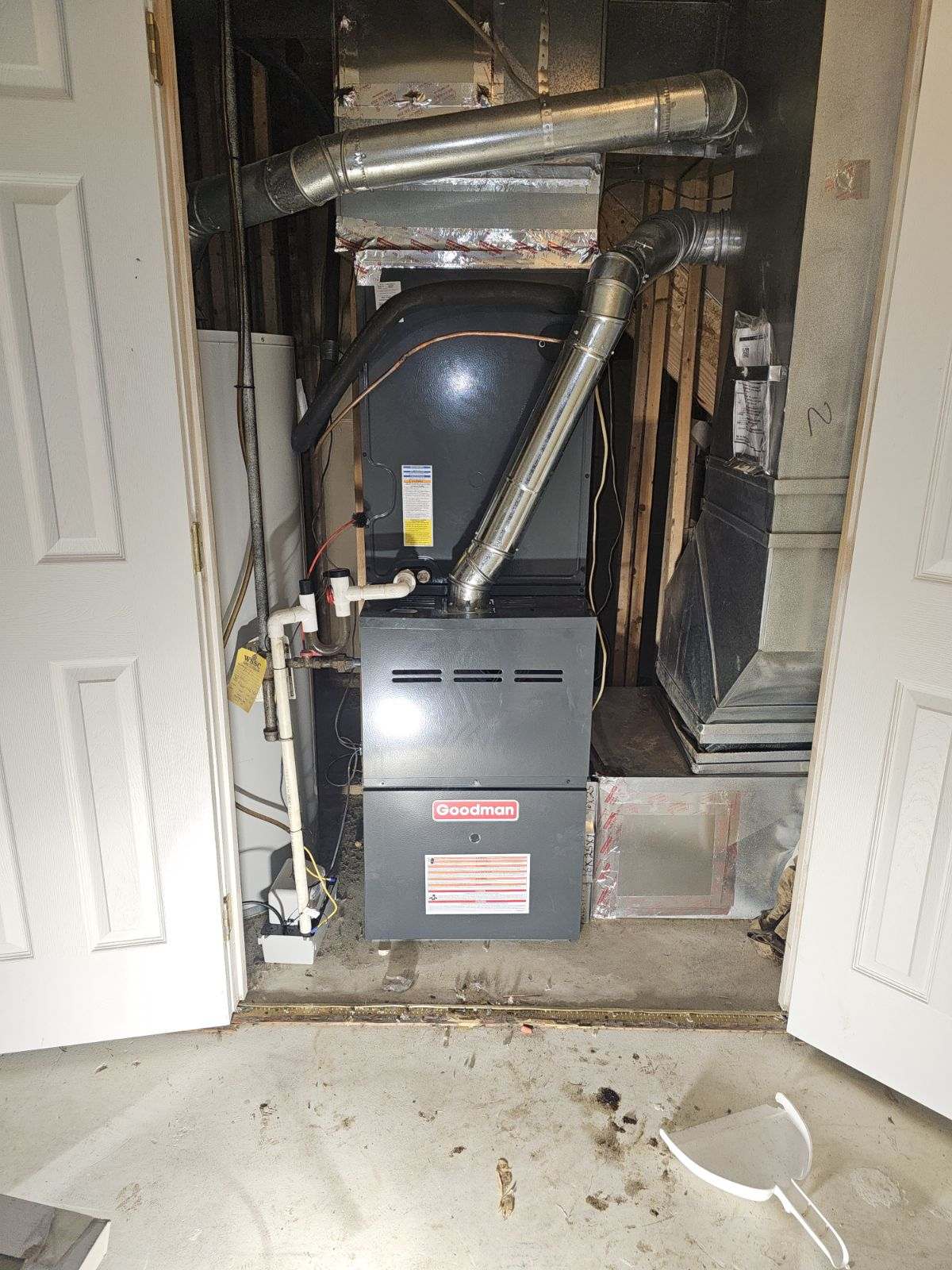 Newly installed Goodman gas furnace with proper venting